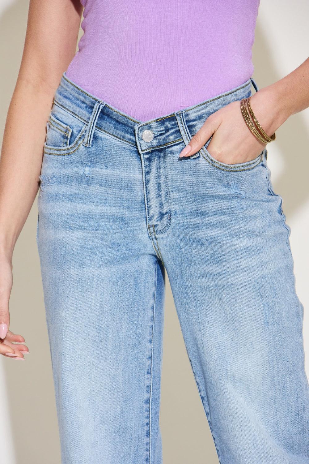 The V Front Waistband Straight Jeans are a stylish and contemporary wardrobe staple. With their modern V-shaped waistband, these jeans add a fashionable twist to the