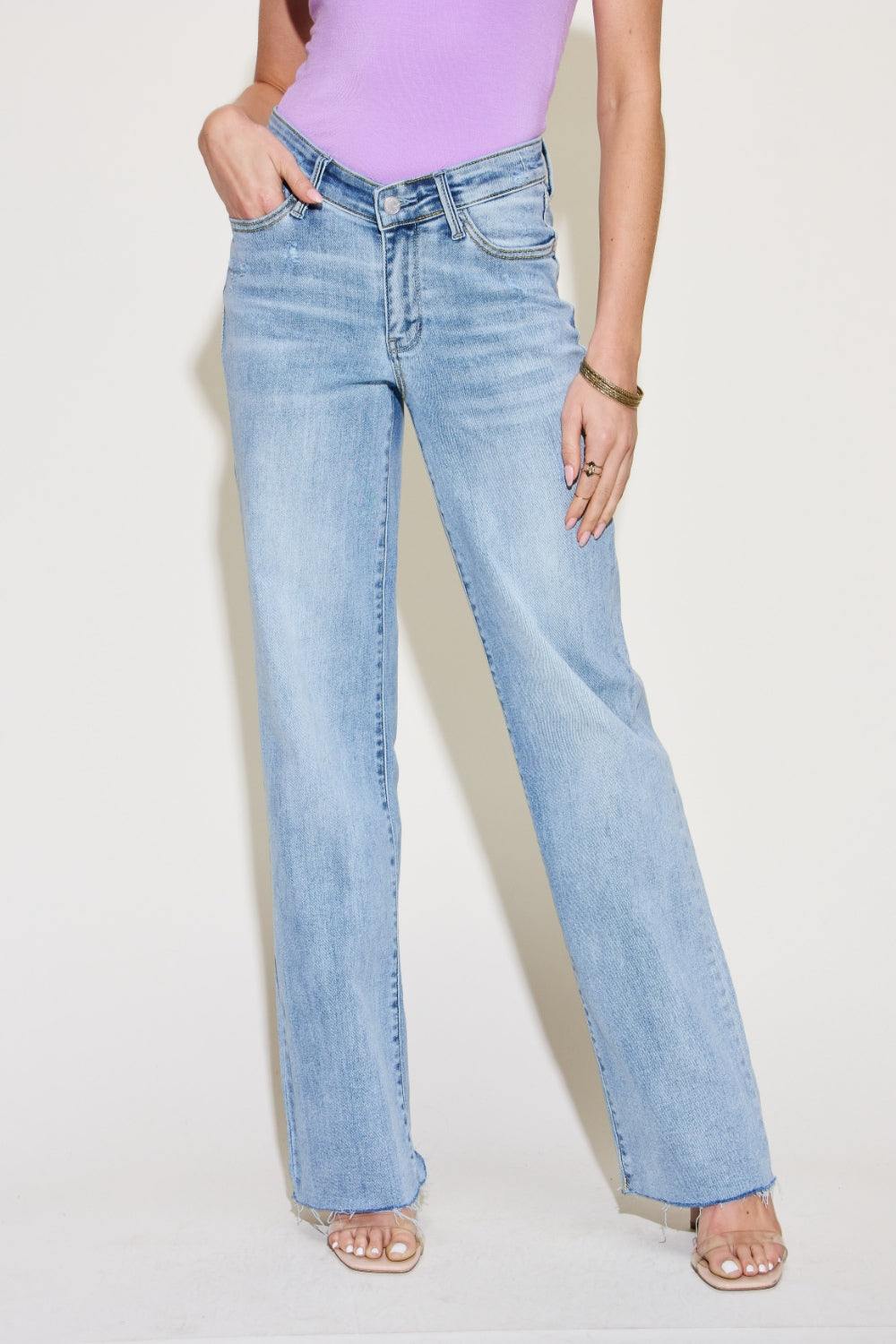 The V Front Waistband Straight Jeans are a stylish and contemporary wardrobe staple. With their modern V-shaped waistband, these jeans add a fashionable twist to the