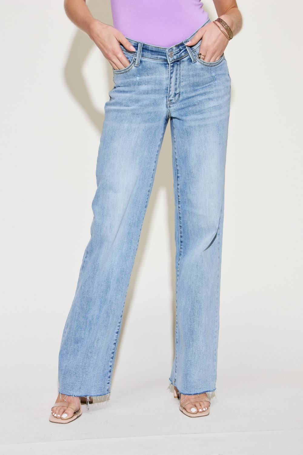 The V Front Waistband Straight Jeans are a stylish and contemporary wardrobe staple. With their modern V-shaped waistband, these jeans add a fashionable twist to the