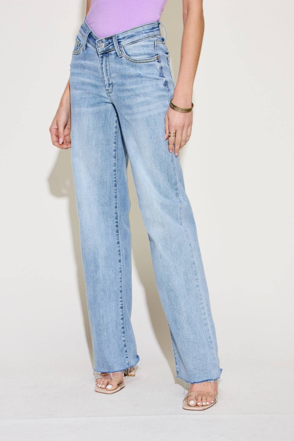 The V Front Waistband Straight Jeans are a stylish and contemporary wardrobe staple. With their modern V-shaped waistband, these jeans add a fashionable twist to the