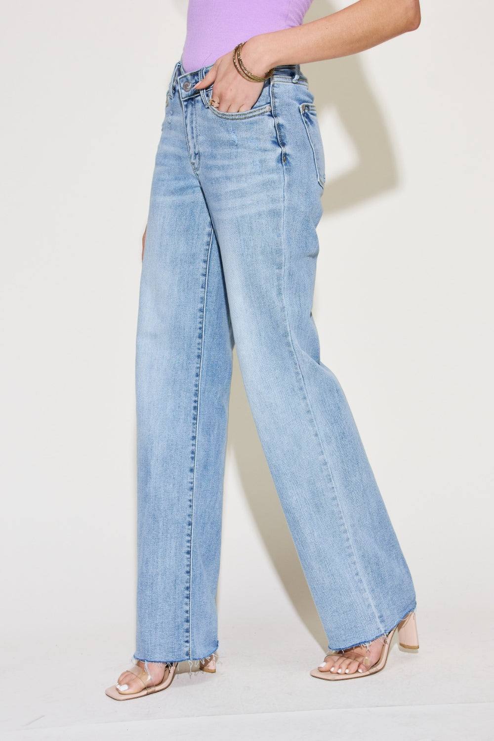 The V Front Waistband Straight Jeans are a stylish and contemporary wardrobe staple. With their modern V-shaped waistband, these jeans add a fashionable twist to the